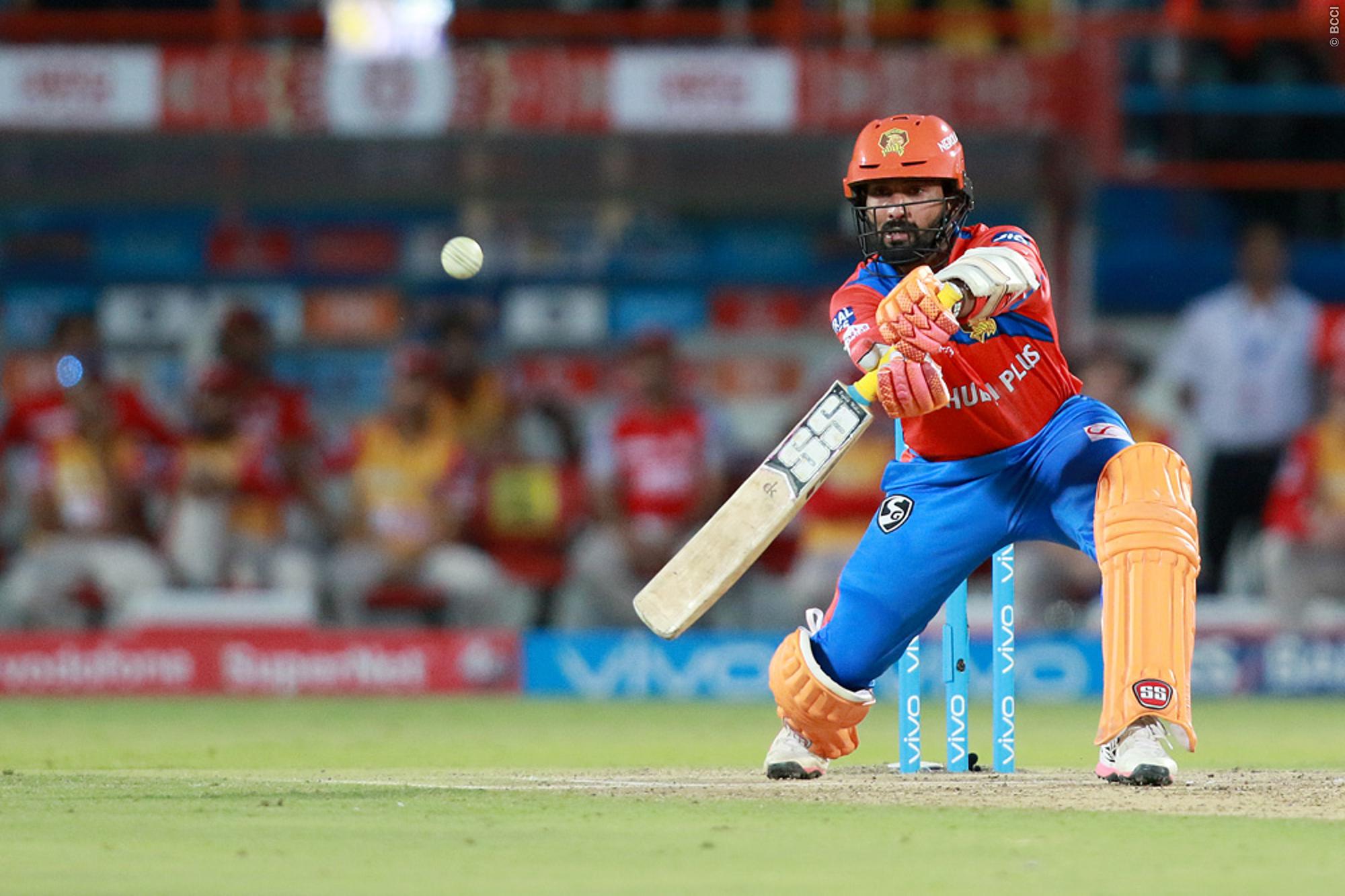 Twitter reacts to Dinesh Karthik's slow innings and Dwayne Smith's exceptional over