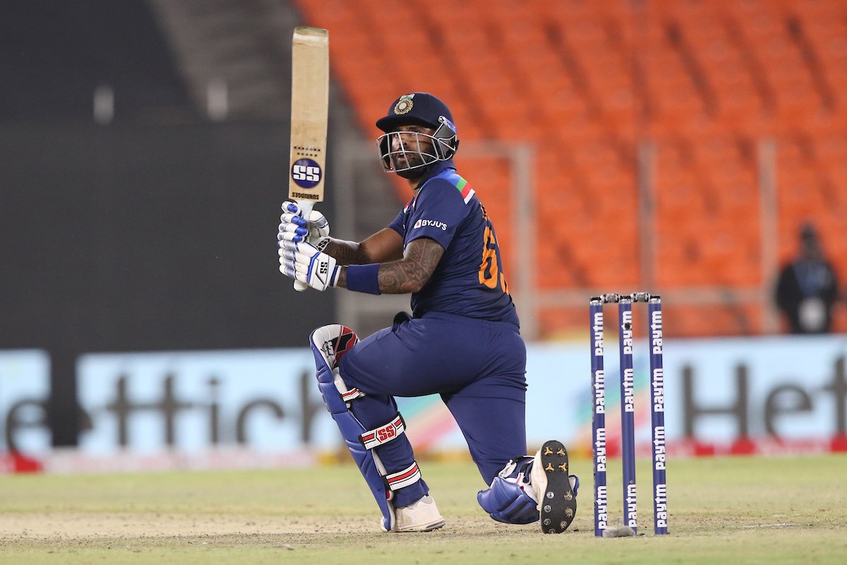 Surya playing a scoop shot against England