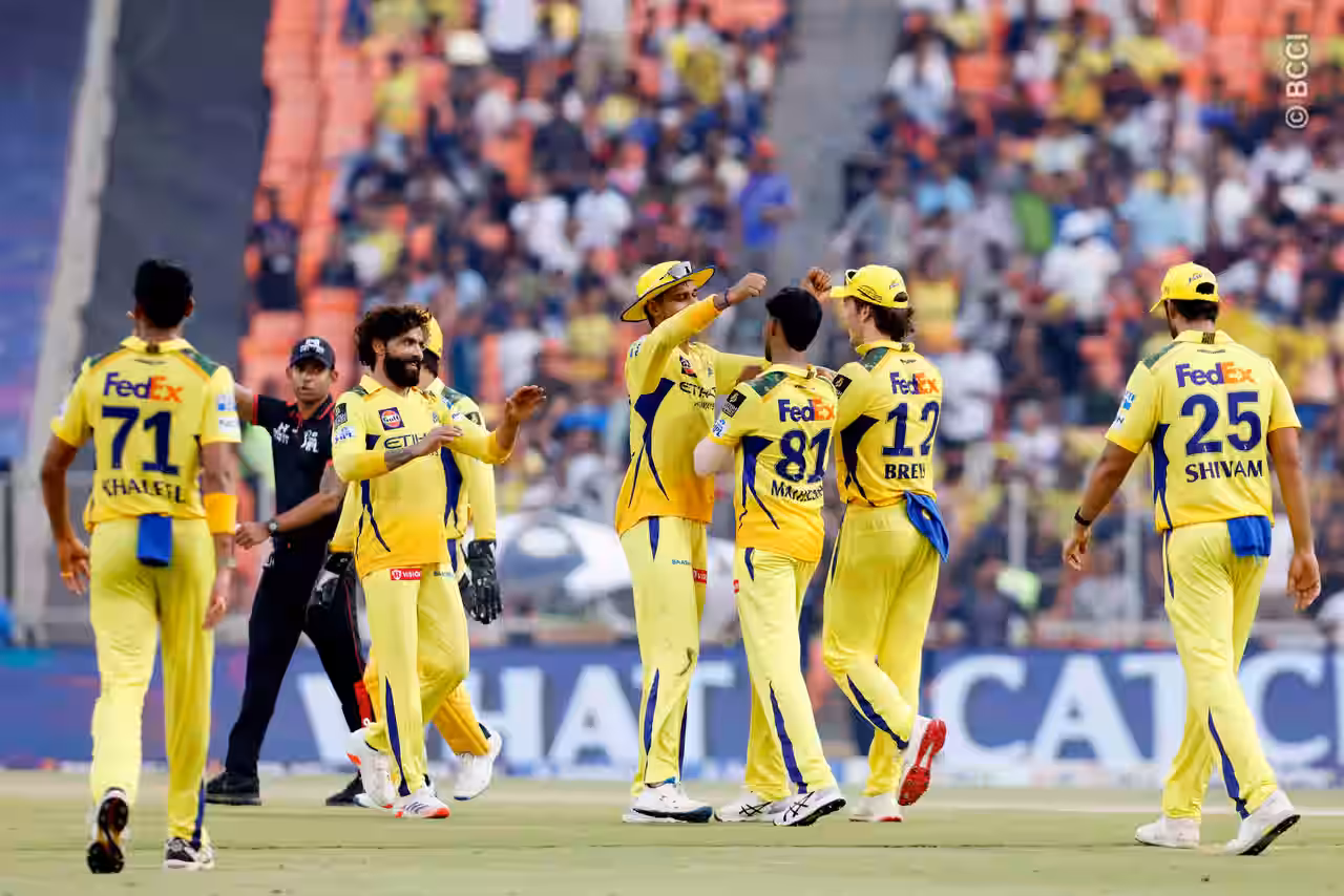 CSK players celebrate a dismissal against GT at the Narendra Modi Stadium in Ahmedabad